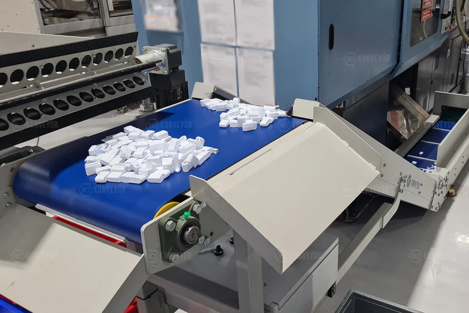 plastic injection conveyor system